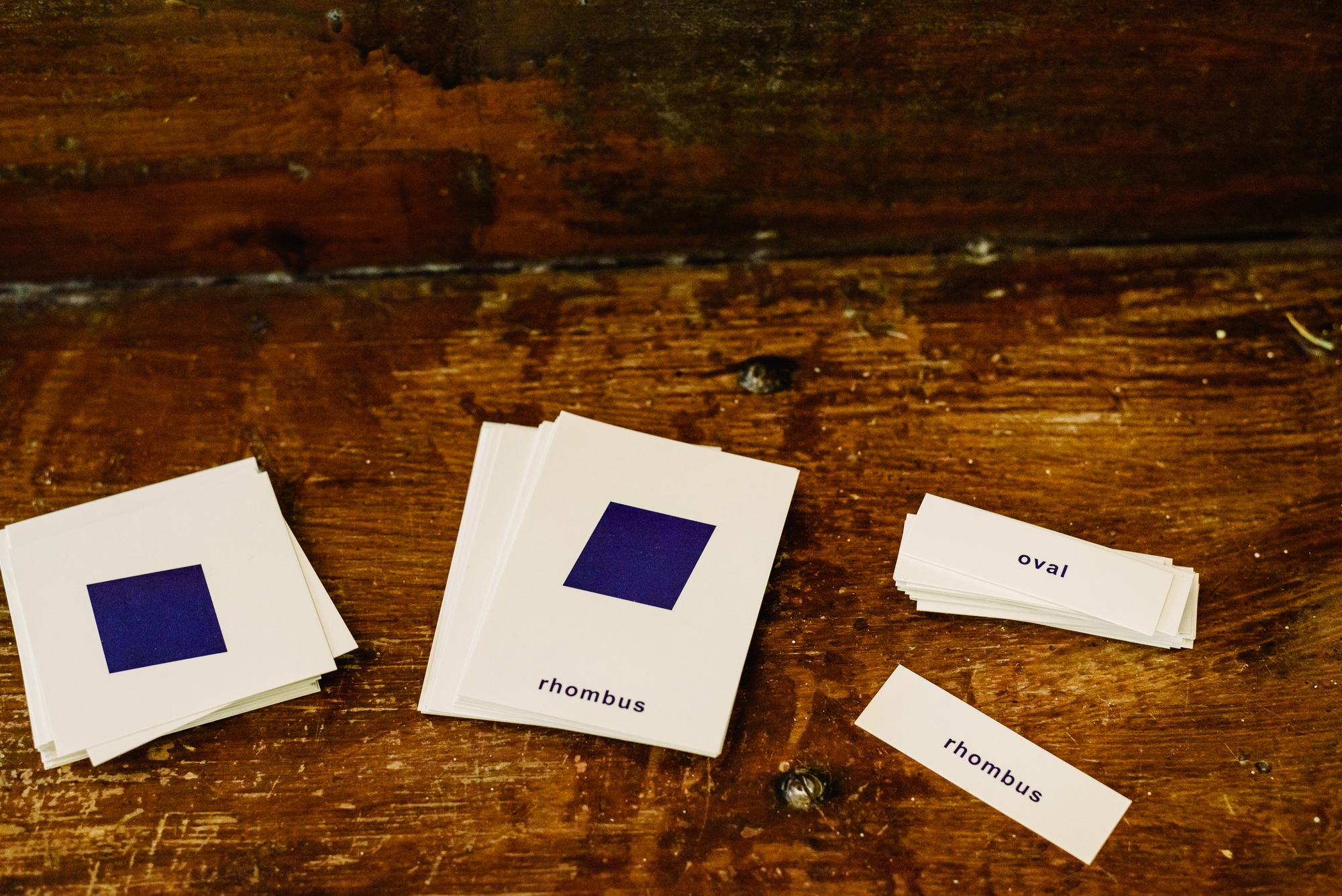 Cards with geometric shapes to teach students in a Montessori classroom